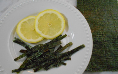 photo of slice of lemon and shredded nora