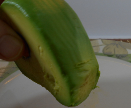 avocado hand to slice