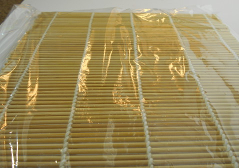 saran wrap around rolling mat