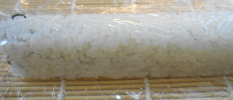saran wrap on sushi roll