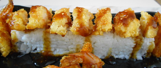 add the teriyaki sauce to the roll drizzle over the shrimp